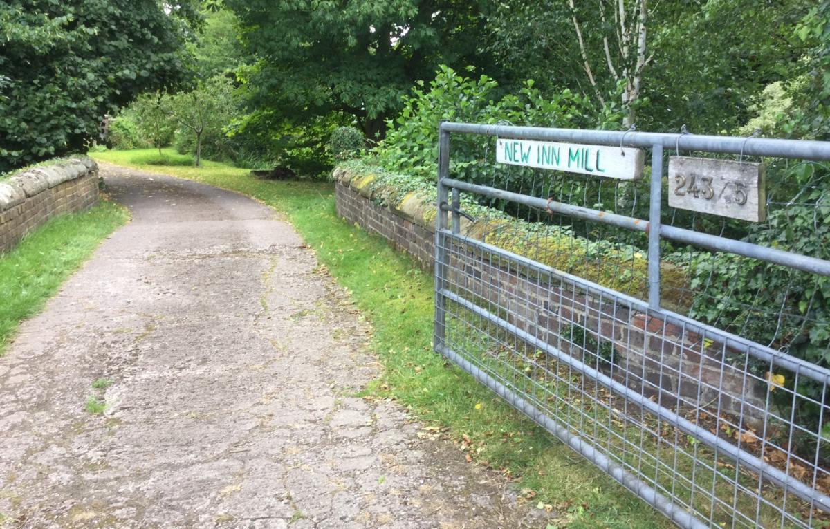 Gate and bridge to the mill